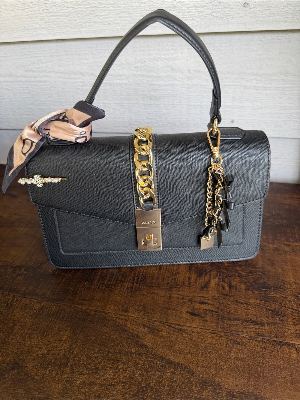 ALDO Black Satchel with Gold Chain and Charm Detail